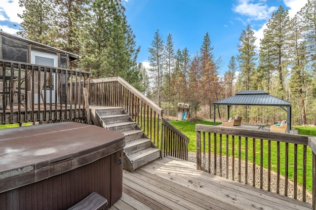 6901 W Depot Springs Rd, Cheney, WA 99004 - wooden deck with a yard, a gazebo, a hot tub, and a playground