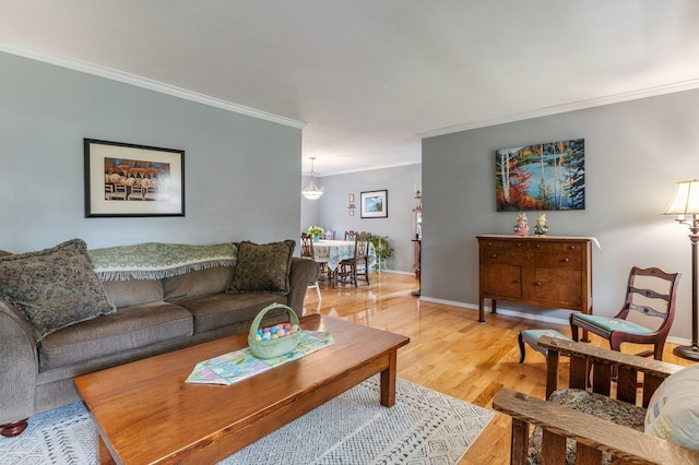 6901 W Depot Springs Rd, Cheney, WA 99004 - living area featuring light wood-type flooring, crown molding, and baseboards