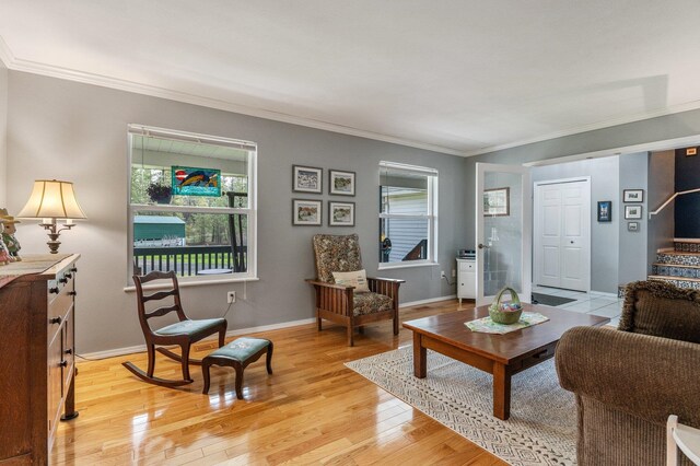 6901 W Depot Springs Rd, Cheney, WA 99004 - living area with stairs, a healthy amount of sunlight, crown molding, and light wood-type flooring