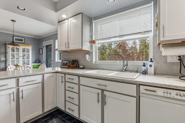 6901 W Depot Springs Rd, Cheney, WA 99004 - kitchen with a sink, backsplash, crown molding, dishwasher, and dark tile patterned floors