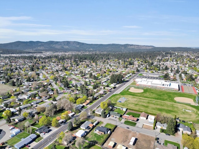 bird's eye view featuring a mountain view and a residential view