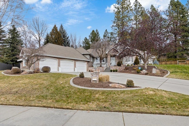 6711 S Highland Park Dr, Spokane, WA 99223 - view of front of home featuring concrete driveway, fence, a front yard, and a garage