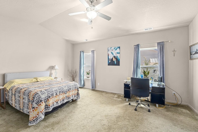 12827 W 3rd Ave, Airway Heights, WA 99001 - carpeted bedroom featuring multiple windows, a desk, and ceiling fan