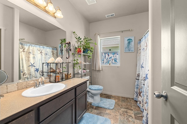 12827 W 3rd Ave, Airway Heights, WA 99001 - full bathroom with vanity, stone finish floors, and curtained shower