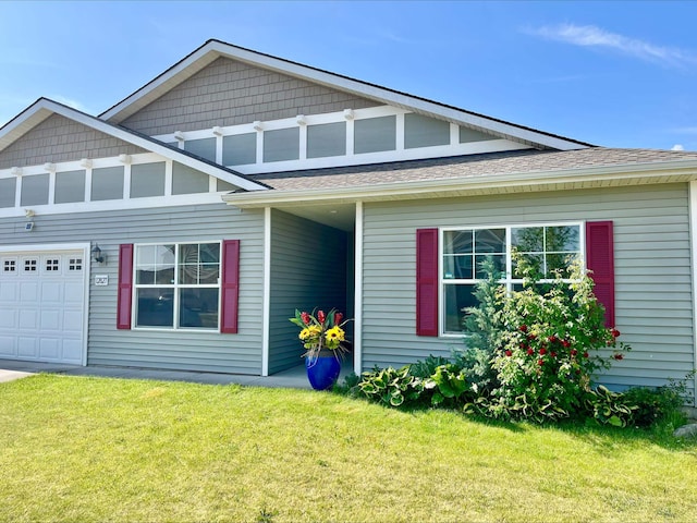 12827 W 3rd Ave, Airway Heights, WA 99001 - view of front of property with a garage, a front yard, and roof with shingles