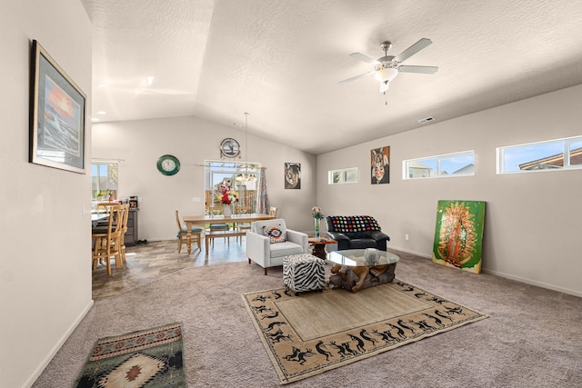 12827 W 3rd Ave, Airway Heights, WA 99001 - carpeted living room with a ceiling fan, lofted ceiling, and a textured ceiling