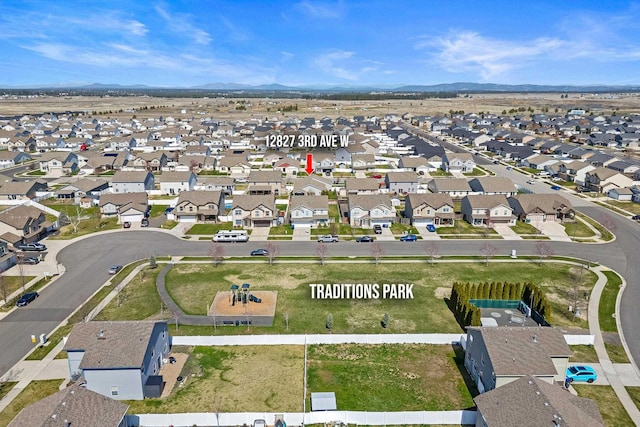 12827 W 3rd Ave, Airway Heights, WA 99001 - aerial view of property's location with a mountain backdrop and nearby suburban area