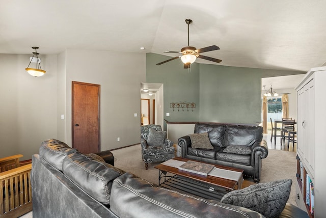112 S Holiday Rd, Spokane Valley, WA 99016 - carpeted living room featuring vaulted ceiling, baseboards, and ceiling fan with notable chandelier