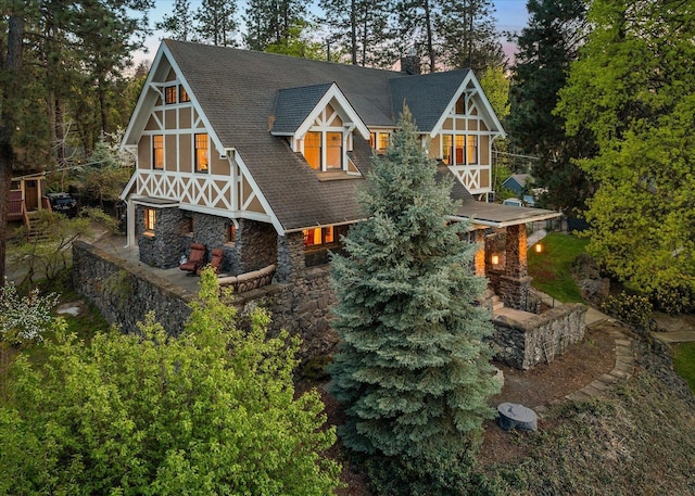 530 E 11th Ave, Spokane, WA 99202 - rear view of house with a shingled roof and a chimney