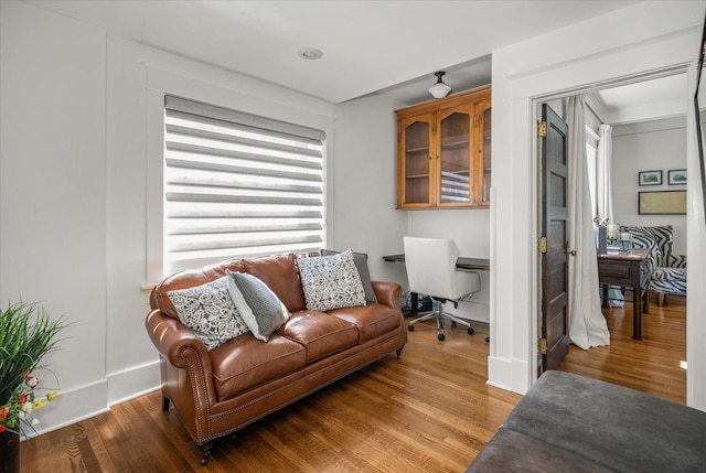 530 E 11th Ave, Spokane, WA 99202 - living room with baseboards and wood finished floors