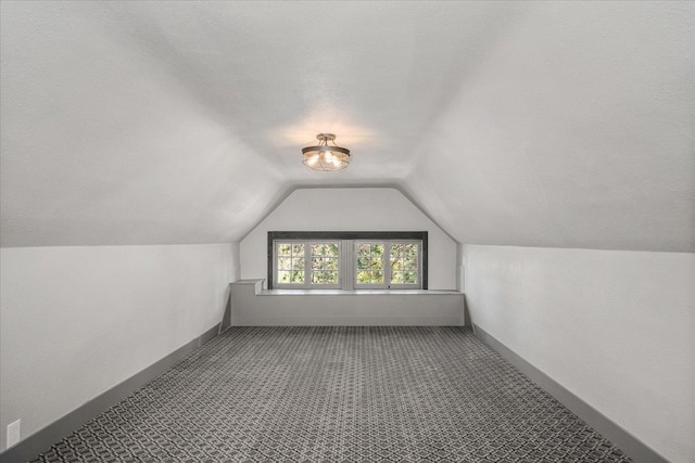 530 E 11th Ave, Spokane, WA 99202 - additional living space featuring carpet flooring, baseboards, and vaulted ceiling
