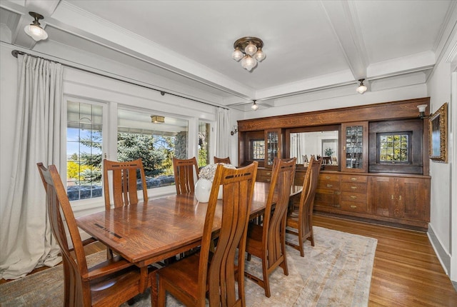 530 E 11th Ave, Spokane, WA 99202 - dining room with crown molding, beam ceiling, and wood finished floors