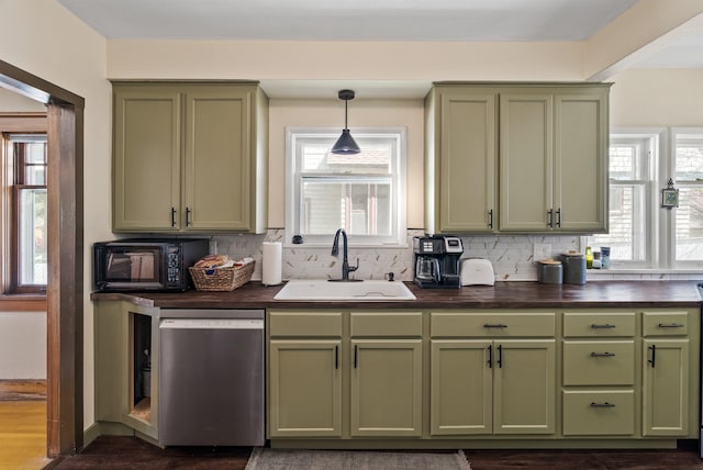 1607 W 11th Ave, Spokane, WA 99204 - kitchen featuring green cabinetry, dishwasher, black microwave, tasteful backsplash, and plenty of natural light