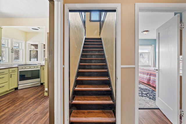1607 W 11th Ave, Spokane, WA 99204 - stairway featuring wood finished floors and plenty of natural light