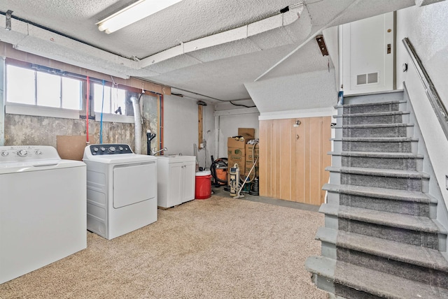 1607 W 11th Ave, Spokane, WA 99204 - below grade area featuring separate washer and dryer, stairway, carpet, and a textured ceiling