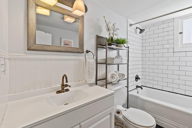 1607 W 11th Ave, Spokane, WA 99204 - full bath featuring vanity, shower / tub combination, and a wainscoted wall