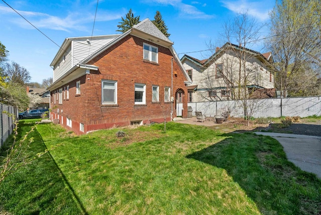 1607 W 11th Ave, Spokane, WA 99204 - rear view of property with brick siding and a patio area