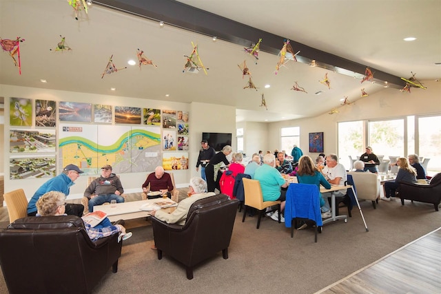 playroom featuring wood finished floors, vaulted ceiling with beams, and recessed lighting