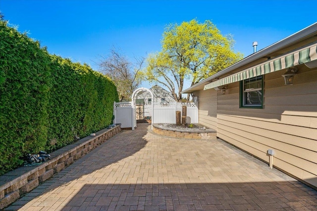 view of patio / terrace with fence