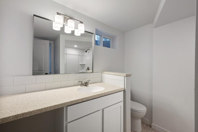 full bathroom featuring backsplash, walk in shower, toilet, and vanity