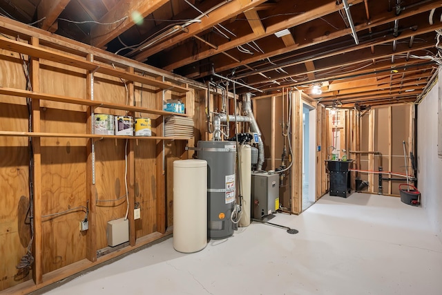 unfinished below grade area featuring secured water heater