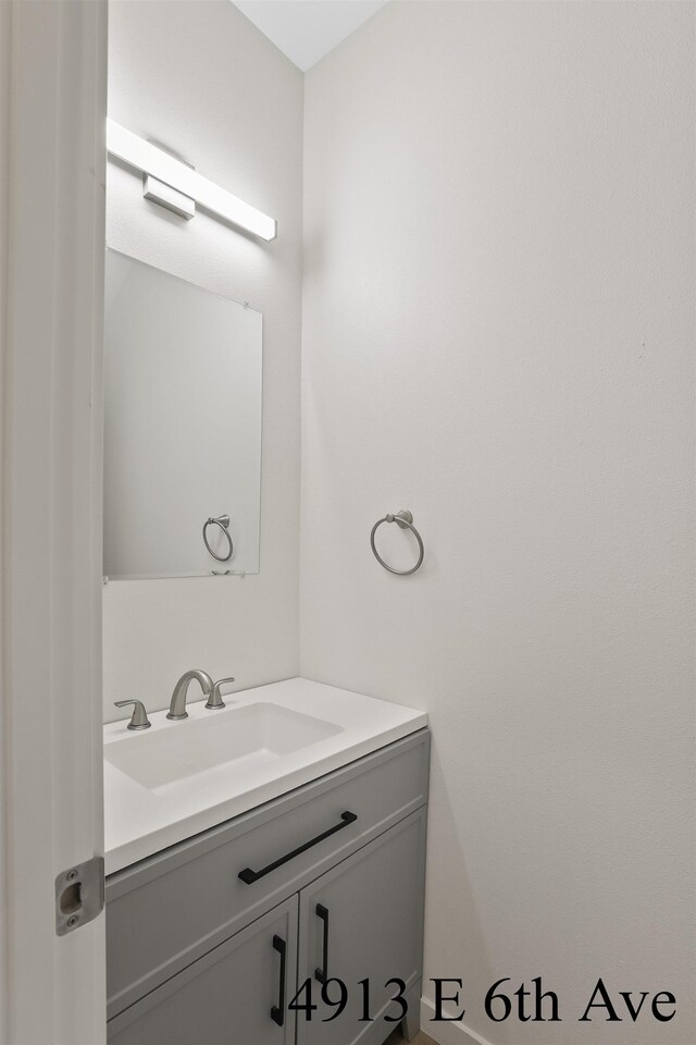 4913 E 6th Avenue 4915E 6Th Ave, Spokane Valley, WA 99212 - bathroom featuring baseboards and vanity