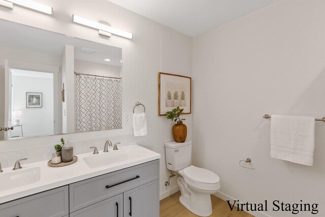 4913 E 6th Avenue 4915E 6Th Ave, Spokane Valley, WA 99212 - full bath with toilet, wood finished floors, a sink, and double vanity