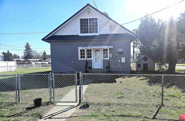 303 N Vernon St, Deer Park, WA 99006 - view of front of house with a front lawn, fence private yard, and a gate