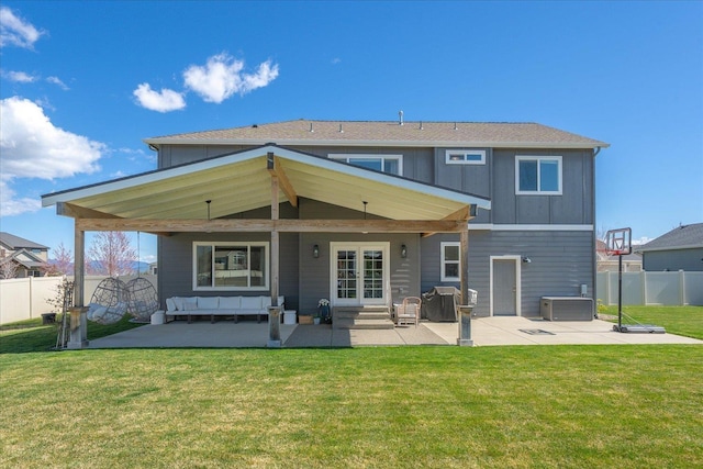 back of property featuring central AC unit, a lawn, fence, a patio, and an outdoor hangout area