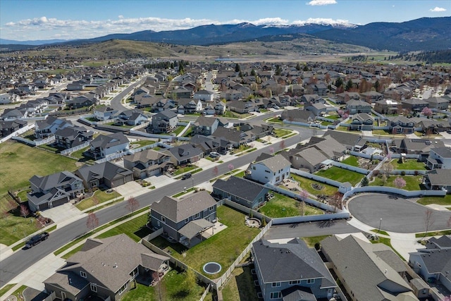 bird's eye view with a residential view and a mountain view
