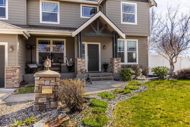 17202 E Morningside Ln, Greenacres, WA 99037 - entrance to property with a lawn, fence, a porch, and stone siding