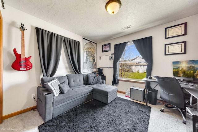 17202 E Morningside Ln, Greenacres, WA 99037 - office with visible vents, carpet floors, baseboards, and a textured ceiling