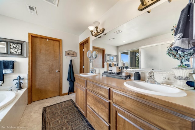 17202 E Morningside Ln, Greenacres, WA 99037 - full bathroom with a garden tub, visible vents, a sink, and double vanity