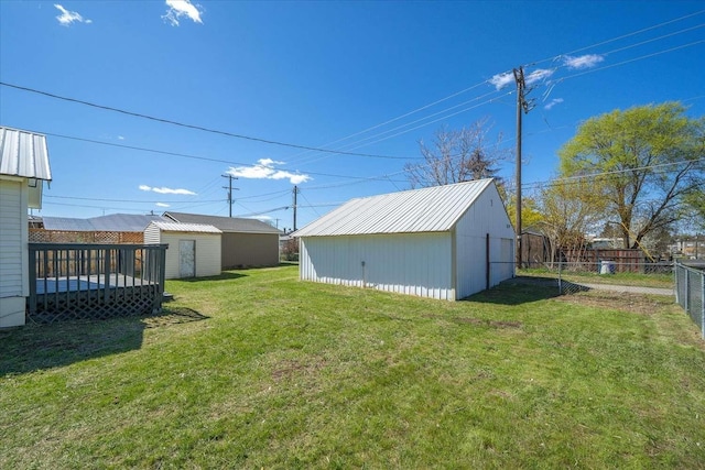 1873 E Marshall Ave, Spokane, WA 99207 - view of yard featuring an outdoor structure and a fenced backyard