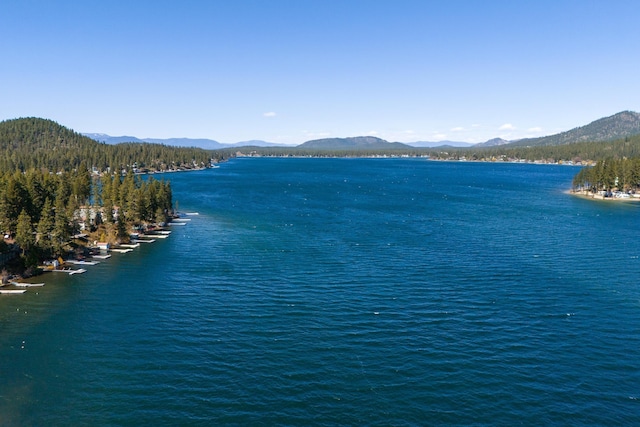 property view of water featuring a mountain view
