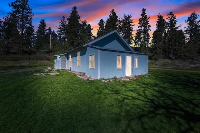 8323 W Mission Ave, Spokane, WA 99224 - property exterior at dusk with a yard