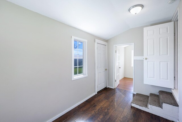 8323 W Mission Ave, Spokane, WA 99224 - interior space featuring lofted ceiling, dark wood-style flooring, and baseboards
