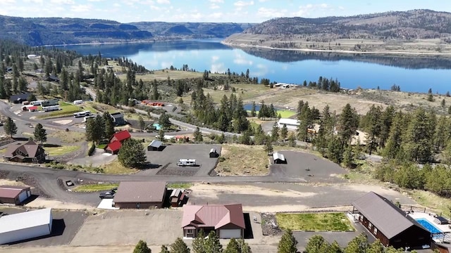 aerial view with a water and mountain view
