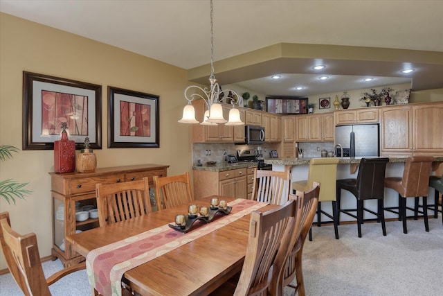 1511 N Lancashire Ln, Liberty Lake, WA 99019 - dining room with recessed lighting, light carpet, and an inviting chandelier