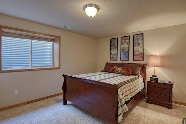 1511 N Lancashire Ln, Liberty Lake, WA 99019 - bedroom featuring light carpet, baseboards, and visible vents