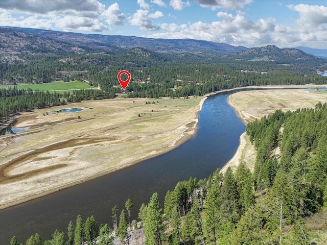 15 E Matsen Creek Rd, Kettle Falls, WA 99141 - drone / aerial view of a forest and a water and mountain view