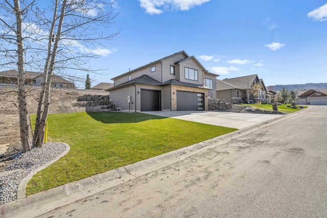 view of front of home featuring a front yard, driveway, a garage, and board and batten siding