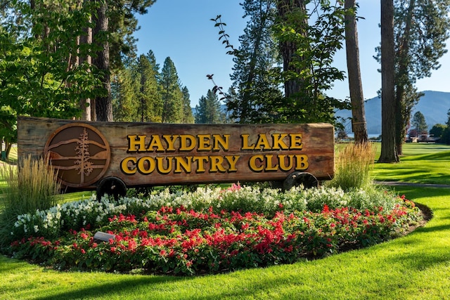 1633 E Northwood Dr, Hayden, ID 83835 - community / neighborhood sign featuring a mountain view and a yard