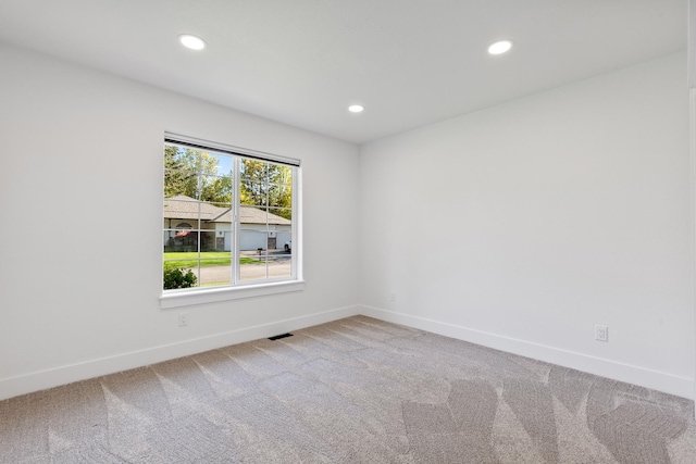 1633 E Northwood Dr, Hayden, ID 83835 - carpeted spare room featuring baseboards, recessed lighting, and visible vents