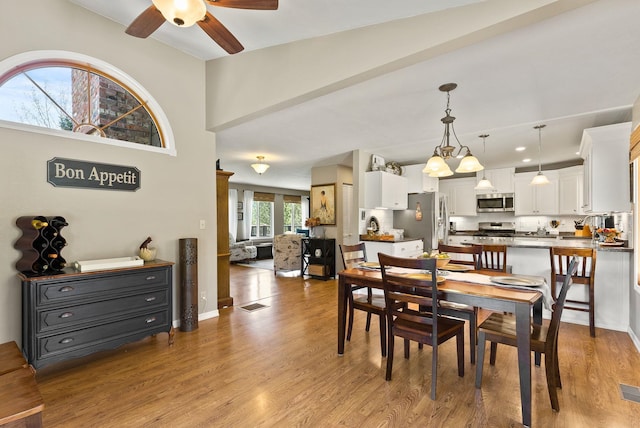 996A Basin Rd, Colville, WA 99114 - dining room with ceiling fan, wood finished floors, and baseboards