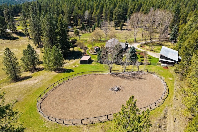 bird's eye view with a forest view