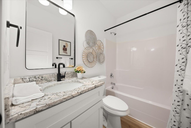 full bath featuring shower / tub combo with curtain, toilet, vanity, and wood finished floors