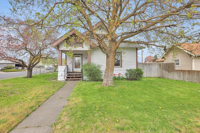 1403 E Olympic Ave, Spokane, WA 99207 - view of front of house featuring a front lawn and fence