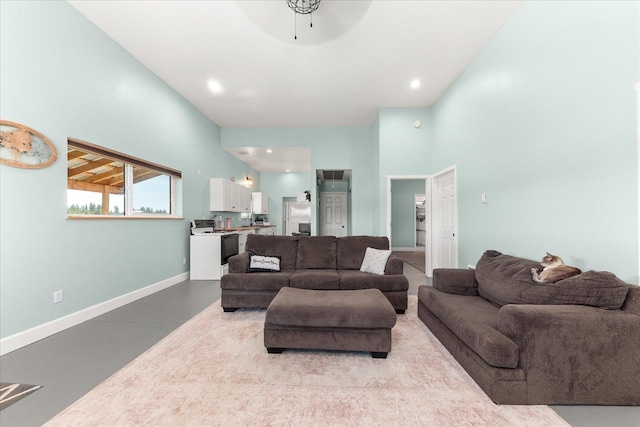 40359 Barbara Ln, Davenport, WA 99122 - living room with ceiling fan, baseboards, and finished concrete floors