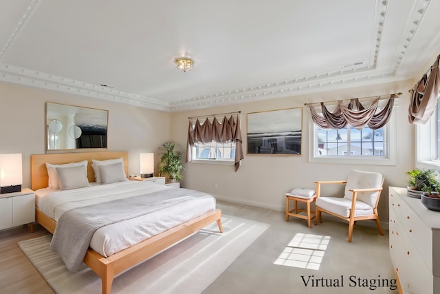 bedroom featuring baseboards and visible vents